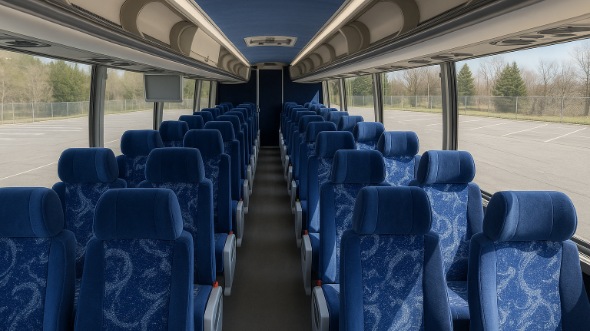 delano 56 passenger charter bus inside